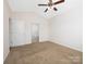Bedroom with ensuite bathroom showcasing a tub and large closet at 170 Atwater Landing Dr, Mooresville, NC 28117