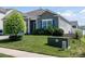 Charming home featuring well-maintained landscaping and vibrant green lawn at 170 Atwater Landing Dr, Mooresville, NC 28117