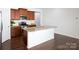 Well-lit kitchen featuring an island, stainless steel appliances, and ample counter space at 170 Atwater Landing Dr, Mooresville, NC 28117