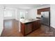Modern kitchen featuring a spacious island with stainless steel appliances at 170 Atwater Landing Dr, Mooresville, NC 28117