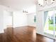 Open living room featuring hardwood floors and sliding glass doors to the backyard at 170 Atwater Landing Dr, Mooresville, NC 28117