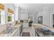 Charming kitchen showcases granite counters, white cabinetry, and stainless steel appliances at 1726 The Plz, Charlotte, NC 28205