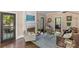 Inviting living room with a cozy fireplace, neutral walls, and hardwood floors at 1726 The Plz, Charlotte, NC 28205