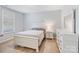 Bright bedroom with a classic white bed frame, side tables, and ample natural light at 190 Tetcott St, Mooresville, NC 28115