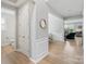 Elegant hallway leading to a dining area and living room with stylish decor at 190 Tetcott St, Mooresville, NC 28115