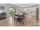 Kitchen with a large island, stainless steel appliances, and outdoor access at 190 Tetcott St, Mooresville, NC 28115