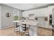 Modern kitchen with white cabinets, stainless steel appliances, and sleek countertops at 190 Tetcott St, Mooresville, NC 28115