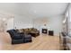 Bright living room featuring a fireplace, plush seating, and neutral decor at 190 Tetcott St, Mooresville, NC 28115