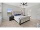 Spacious main bedroom with a large bed, windows, and ensuite bathroom at 190 Tetcott St, Mooresville, NC 28115