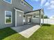 Exterior of home shows a backyard patio and white fence at 2012 Embassy Ct # 46, Charlotte, NC 28213