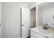 Bathroom with white cabinets, granite countertops and door to toilet at 2012 Embassy Ct # 46, Charlotte, NC 28213