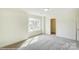 Spacious bedroom featuring a large window at 2012 Embassy Ct # 46, Charlotte, NC 28213