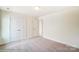 Bedroom with white walls, carpet floor and double door closet at 2012 Embassy Ct # 46, Charlotte, NC 28213