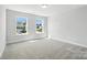 Bedroom featuring carpet flooring, natural light, and neutral walls at 2012 Embassy Ct # 46, Charlotte, NC 28213
