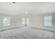 Spacious bedroom with neutral carpeting and multiple windows bringing in natural light at 2012 Embassy Ct # 46, Charlotte, NC 28213
