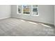 Bedroom featuring natural light, carpet flooring and neutral walls at 2012 Embassy Ct # 46, Charlotte, NC 28213