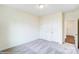 Bedroom with soft carpet, white walls, and closet with access to other rooms at 2012 Embassy Ct # 46, Charlotte, NC 28213