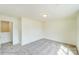 Empty bedroom features neutral walls, carpet and light fixture at 2012 Embassy Ct # 46, Charlotte, NC 28213