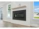 Modern fireplace with a sleek design and plenty of natural light coming in from the windows at 2012 Embassy Ct # 46, Charlotte, NC 28213