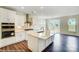 Modern kitchen with sleek countertops, a stylish range hood, and stainless steel appliances at 2012 Embassy Ct # 46, Charlotte, NC 28213