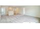 Spacious loft area with neutral carpeting and ample natural light, perfect for a flexible living space at 2012 Embassy Ct # 46, Charlotte, NC 28213