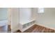 Mud room with bench and storage cubbies, bright natural light, and wood floors at 2012 Embassy Ct # 46, Charlotte, NC 28213