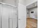 This bathroom features a glass-doored shower, white door and a view into the room at 206 Montclair Dr, Locust, NC 28097