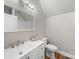Clean bathroom featuring a white vanity, large mirror, and a standard toilet at 206 Montclair Dr, Locust, NC 28097
