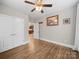 Cozy bedroom with hardwood floors, closet, and a charming decor at 206 Montclair Dr, Locust, NC 28097