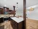 Spacious kitchen with wooden cabinets, stainless steel appliances, and a large island at 206 Montclair Dr, Locust, NC 28097