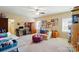 Spacious bonus room with natural light, versatile layout, and comfortable seating at 2119 Augusta National Dr, Denver, NC 28037