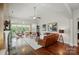 Inviting living room featuring a fireplace, and lots of natural light at 2119 Augusta National Dr, Denver, NC 28037