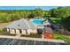Aerial shot showcasing the community pool with slides, pergolas, and a clubhouse at 2119 Augusta National Dr, Denver, NC 28037
