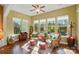 Bright sun room with lots of windows and hardwood floors at 2119 Augusta National Dr, Denver, NC 28037