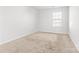 Bright bedroom with neutral carpet and a window at 2120 Redstone Dr, York, SC 29745