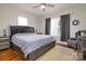 Bedroom features neutral tones and a luxurious silver and black color palette at 2124 Roslyn Ave, Charlotte, NC 28208
