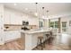 Spacious kitchen featuring granite countertops, stainless steel appliances, and a breakfast bar at 2158 Winhall Rd, Fort Mill, SC 29715