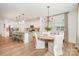 Open concept living space with breakfast bar, dining area, and an island kitchen at 2158 Winhall Rd, Fort Mill, SC 29715