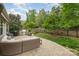 Charming outdoor patio with a built-in grill, furniture, and lush green lawn at 2158 Winhall Rd, Fort Mill, SC 29715
