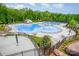 Community pool area with ample seating and a spacious sun deck for residents to enjoy at 2158 Winhall Rd, Fort Mill, SC 29715