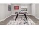 Basement game room with foosball table, stylish decor, and wet bar, ideal for entertainment and relaxation at 221 Belton Ave, Mount Holly, NC 28120