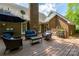 Relaxing back deck area with outdoor seating, a grill, and views of the yard at 2382 Erika Ln, Gastonia, NC 28056