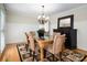 Cozy dining room features natural light, decorative rug, and black cabinet accenting the space at 2382 Erika Ln, Gastonia, NC 28056