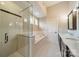 Luxurious bathroom featuring a separate glass-enclosed shower and soaking tub at 2400 Commonwealth Ave, Charlotte, NC 28205