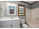 Bathroom with vanity, toilet and tub at 2439 Caswell Ct, Gastonia, NC 28054