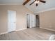 Bright bedroom with ample closet space and neutral walls at 2439 Caswell Ct, Gastonia, NC 28054
