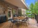 Outdoor deck features wood floors, brick exterior, and retractable awning at 246 Mcduffie Ln, Fort Mill, SC 29715
