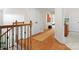 Bright hallway featuring hardwood floors, white walls, closet, and natural light at 246 Mcduffie Ln, Fort Mill, SC 29715