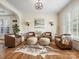 Cozy living room with hardwood floors, decorative lighting, and stylish furniture at 246 Mcduffie Ln, Fort Mill, SC 29715