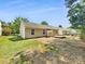 Backyard showcasing a deck and lawn with minimal landscaping at 2512 Captains Watch Ne Rd, Kannapolis, NC 28083